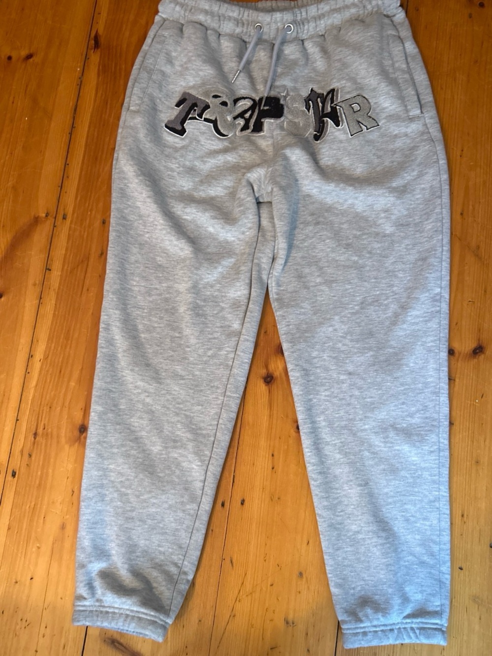 Trapstar it’s a secret Joggers with Black Graphic Text